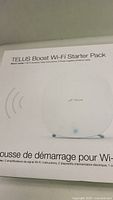 Front angled view of Telus Boost Wi-Fi Starter Pack box showing product name and image of Wi-Fi booster
