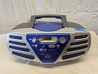 Front view of Magnavox boom box showing controls, digital display, and speakers