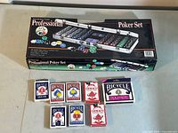 Eight decks of playing cards displayed, including five Bicycle decks, three Gemaco decks, and one Bicycle Solitaire 2 decks set with rules.