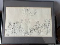 Framed pen and ink artwork showing full piece with figures of dancers and musicians in black frame.