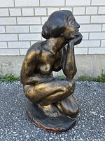 Front view of the kneeling lady bronze finished chalkware statue showing profile and base