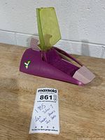 Left side view of Lex Soar 7 body with canopy and note card