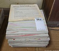 Stack of Armstrong VCT tiles with instruction sheet on top