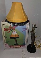 Lamp assembled with shade beside original box