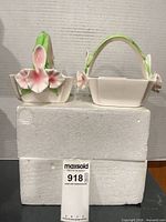 Both floral glass baskets front view on styrofoam block