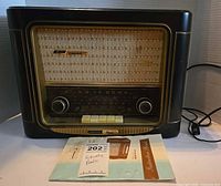 Front view of Grundig Classic 960 radio with manual