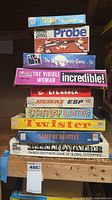 Full stack of ten boxed games showing titles and box conditions