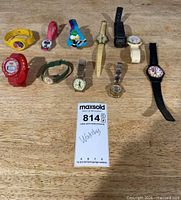All eleven watches laid out on table