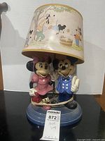 Full view of Mickey and Minnie ceramic lamp with shade