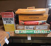 Stacked boxed sets showing fronts and labels