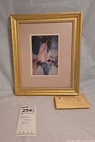 Front view of framed Narizzano print with lot tag and envelope