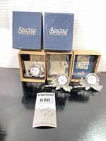 Overall lot: three Seagull Pewter clocks with boxes and certificates visible