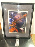 Front view of framed signed Star Trek DS9 lithograph