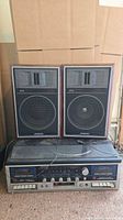 Full view of stereo unit with both speakers stacked on top