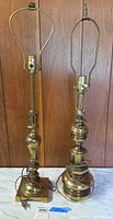 Two brass table lamps full view