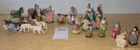 Full group of chalkware nativity figures and animals on table