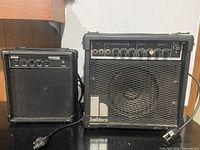 Both amplifiers side by side showing overall condition and front panels