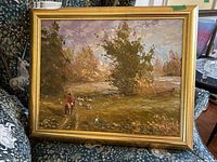 Full view of the framed painting showing entire artwork and frame