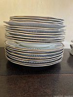 Stacked plates and bowls showing profile and combined height