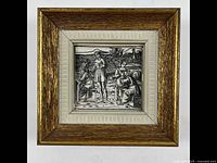 Frontal view of the antique framed woodcut showing the detailed black and white print and decorative matting inside a gold-tone wooden frame.