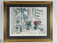 Frontal view of framed lithograph showing entire artwork, mat, and frame