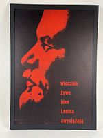 Front view of the framed lithographed poster showing Lenin's profile in red on black with Polish text.