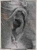 Full view of the black and silver pop art poster showing the pierced ear image with halftone dot effect.