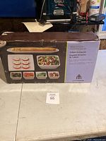 Original packaging box showing the complete 7-piece set with food examples on dishes.