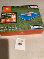 Photo of the Ozark Trail Kids' Airbed new in box showing product packaging with image of blue inflatable bed and product specs
