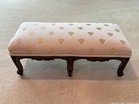 Angled front view showing full footstool.