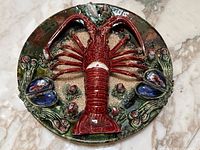 Front top-down view showing full plate and relief design