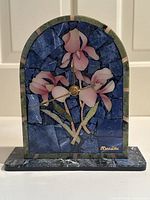Front view of vintage Mosalite mosaic stone clock with pink flower floral design and stone base.