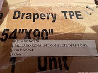 Box label showing Millano Rona 10-piece complete drapery set in taupe, 54 x 90 inches.