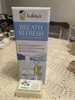 Kalaya Breath Refresh oral health kit box with a luxury bar soap placed in front, showing branding and product types.