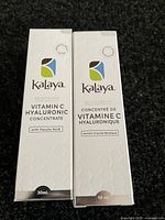 Two Kalaya Vitamin C Hyaluronic Concentrate boxes, one English and one French, each 30mL, front view.