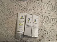 Three Kalaya branded skin care products including two Vitamin C & Hyaluronic Concentrate boxes and one Pain Relief Cream tube