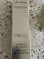 Side box view of M. Asam Resveratrol Premium Essence of Youth essence showing NT50 Navigation Technology and volume 50ml 1.69 fl. oz.