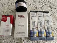 Lot overview showing all six Philosophy skin care products including serum box, three peeling mousse boxes, and a cream jar.