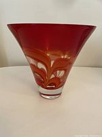 Photo of the red crystal bowl showing tapered shape and swirling interior pattern.