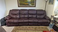 Front view of full sectional sofa against wall