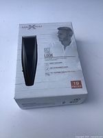 Front of the box showing the MaxTrim hair clipper image and brand name with 19 pieces mentioned