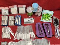 Overview of nail files, hair cutting scissors, nail buffers, makeup pads, packaged cosmetic items, and a hairbrush.