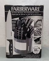Front of original box showing Farberware branding and main cutlery carousel set with knives and tools.