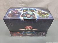 Front view of sealed Lightseekers Kindred trading card deck box showing characters and Mountain symbol.