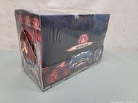 Sealed Lightseekers Kindred Mountain trading card decks set in shrink wrap, showing side view with Mountain label and some character artwork.