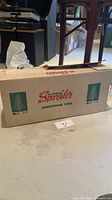 Closed original cardboard box labeled “Aluminum Sparkler Christmas Tree” with Life logo and height marking