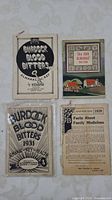 Three Burdock Blood Bitters almanacs from 1929, 1931, and 1933 with black and white covers and one informational page discussing family medicines.