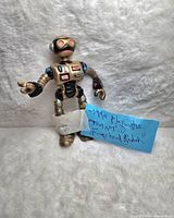 Full view of the 1990 Playmates TMNT Fugitoid Robot figure showing front pose and colors