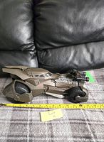 Side view of Batmobile showing length with measuring tape and Lot 11 note