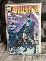 Comic book with Batman on cover, bagged and boarded